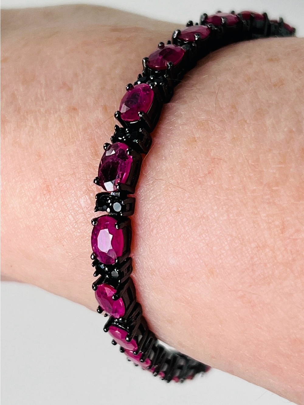 Genuine Ruby & Black Spinel 7” Bracelet. Black Rhodium over 925. 21 Oval Rubies.